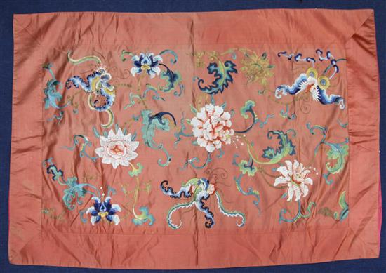 A Chinese coral coloured satin panel, early 20th century, 134 x 86cm